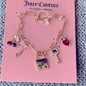 Juicy Couture- New link chain gold tone charm bracelet and rhinestones
